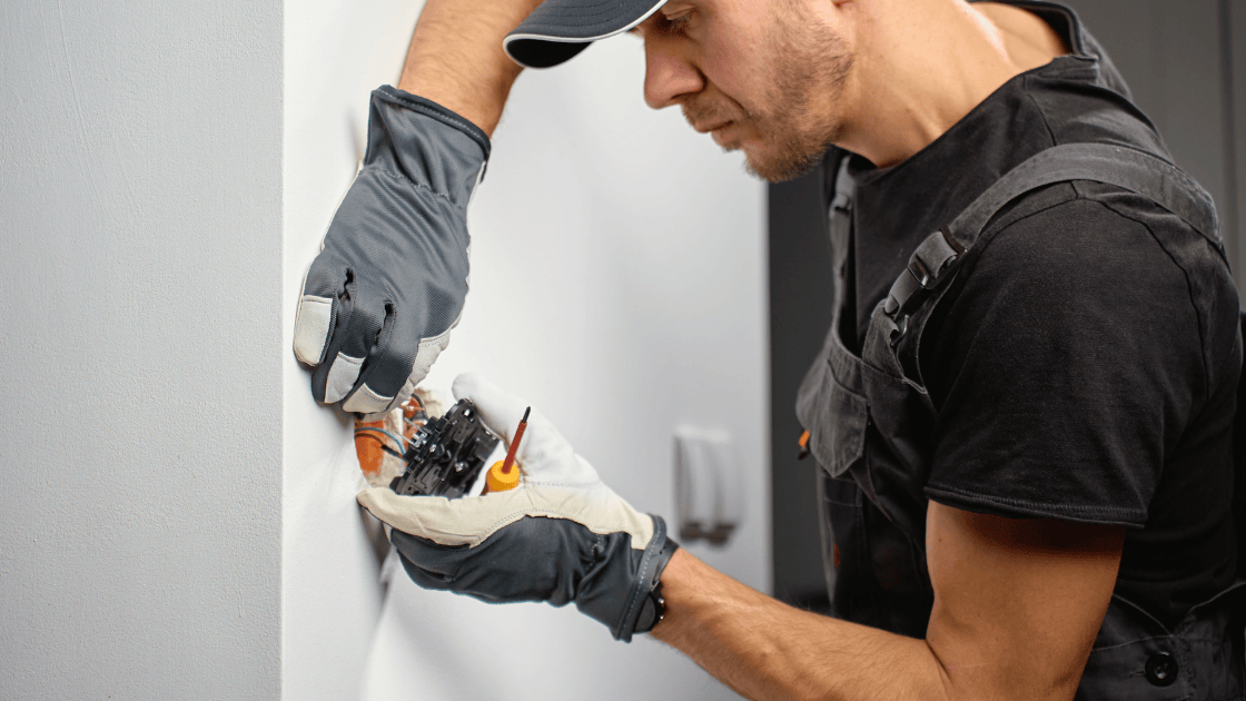 Electrician reviewing their business website on a tablet